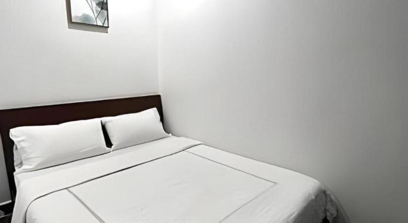 Oyo 90936 Hotel Manjoi Inn อิโปห์ ภายนอก รูปภาพ